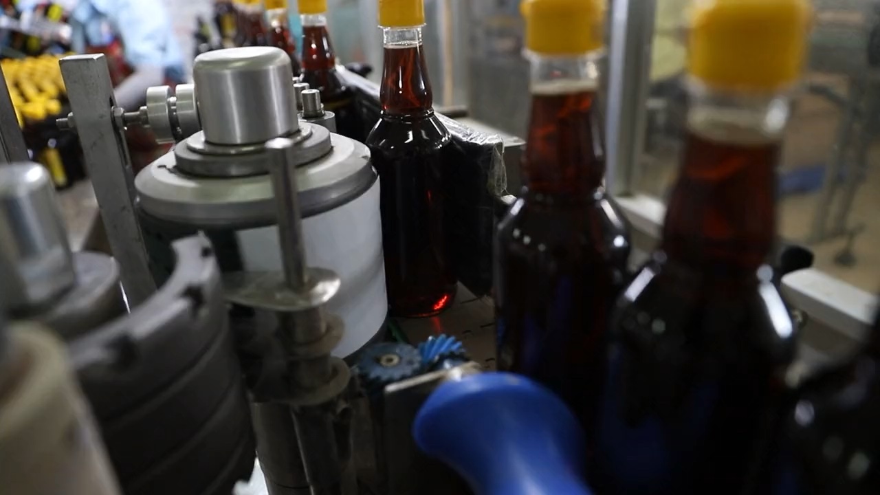 Illustrative image of bottles on a bottling line